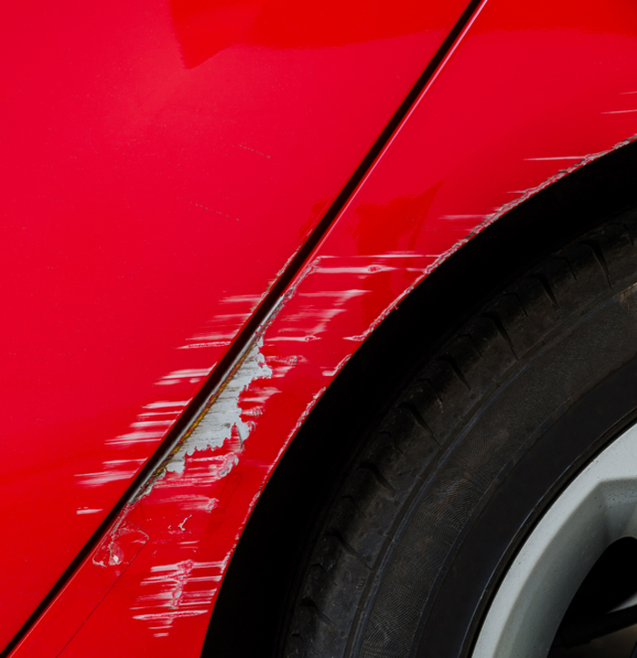 Scratched Body Of Red Car — Auto Body Repairs in Port Stephens, NSW